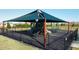 Community playground with shade structure at 5394 Arlington River Dr, Lakeland, FL 33811