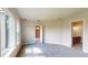 Spacious bedroom with carpet and ensuite bathroom access at 128 Mosaic Blvd, Daytona Beach, FL 32124