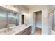 Double vanity bathroom with walk-in shower and separate tub at 128 Mosaic Blvd, Daytona Beach, FL 32124