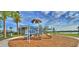 playground with slides and play structures at 128 Mosaic Blvd, Daytona Beach, FL 32124