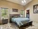 Comfortable bedroom with large closet and tiled floors at 10820 Sw 31St Way, Webster, FL 33597