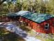 Aerial view of barn and surrounding area at 10820 Sw 31St Way, Webster, FL 33597