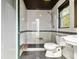 Clean bathroom with a walk-in shower and modern fixtures at 10820 Sw 31St Way, Webster, FL 33597
