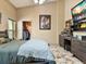 Spacious bedroom with walk-in closet and tiled floors at 10820 Sw 31St Way, Webster, FL 33597