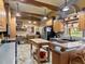 Bright kitchen with island, ample counter space, and wood cabinets at 10820 Sw 31St Way, Webster, FL 33597