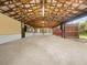 Large, open garage or workshop with high ceilings and concrete flooring at 10820 Sw 31St Way, Webster, FL 33597