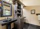 Elegant bathroom with black sink and large walk-in shower at 10820 Sw 31St Way, Webster, FL 33597