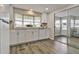 Newly remodeled kitchen with white cabinets and stainless steel appliances at 1610 Reynolds Rd # 5, Lakeland, FL 33801