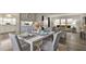 Bright dining area with seating for four and kitchen views at 1610 Reynolds Rd # 5, Lakeland, FL 33801