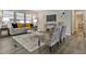 Living room with sofa, armchairs, and a coffee table at 1610 Reynolds Rd # 5, Lakeland, FL 33801