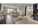 Open concept living area with dining and kitchen views at 1610 Reynolds Rd # 5, Lakeland, FL 33801