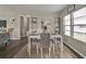 Dining area with table, chairs, and built-in shelving at 1610 Reynolds Rd # 5, Lakeland, FL 33801