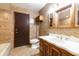 Bathroom with a toilet, sink, and shower at 8723 A D Mims Rd, Orlando, FL 32818