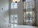 Spacious entryway featuring double doors and large windows at 1557 Amaryllis Cir, Orlando, FL 32825