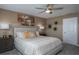 Spacious main bedroom with a king-size bed, and plenty of natural light at 1153 Deepwater Cir, Eagle Lake, FL 33839