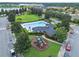 Community pool, playground, and clubhouse aerial view at 625 Legacy Park Dr, Casselberry, FL 32707
