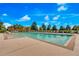 Inviting community pool with lounge chairs and clear water at 625 Legacy Park Dr, Casselberry, FL 32707
