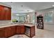 Well-equipped kitchen, granite counters, and ample wood cabinetry at 625 Legacy Park Dr, Casselberry, FL 32707