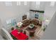Open concept living and dining area with high ceilings and hardwood floors at 625 Legacy Park Dr, Casselberry, FL 32707