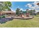 Community playground with modern play structures at 625 Legacy Park Dr, Casselberry, FL 32707