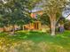 Spacious backyard with lush lawn, patio, and grill at 625 Legacy Park Dr, Casselberry, FL 32707