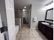 Bathroom with double vanity, shower, and tub at 14501 Grove Resort Ave # 1617, Winter Garden, FL 34787