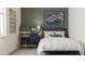 Bright bedroom with built-in desk and a comfy bed at 3990 Willowbrook Dr, Edgewater, FL 32141