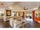 Open living area showcasing hardwood floors and a spacious layout at 8339 Bridgeport Bay Cir, Mount Dora, FL 32757