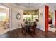 Cozy breakfast nook with a glass-top table and lake views at 8339 Bridgeport Bay Cir, Mount Dora, FL 32757