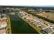 Community features waterfront homes and lush landscaping at 8339 Bridgeport Bay Cir, Mount Dora, FL 32757