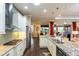 Spacious kitchen with granite countertops and island at 8339 Bridgeport Bay Cir, Mount Dora, FL 32757