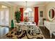 Spacious dining area with hardwood floors and stylish decor at 8339 Bridgeport Bay Cir, Mount Dora, FL 32757