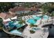 Resort-style pool, clubhouse, and water features at 2705 Bushman Dr, Kissimmee, FL 34746