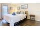 Comfortable bedroom with a queen-size bed and access to balcony at 2705 Bushman Dr, Kissimmee, FL 34746
