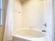 Clean bathroom with a shower/tub combo at 2705 Bushman Dr, Kissimmee, FL 34746