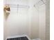 Simple closet with wire shelving and wooden hangers at 2705 Bushman Dr, Kissimmee, FL 34746