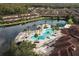 Large community pool and surrounding homes at 2705 Bushman Dr, Kissimmee, FL 34746