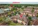 Aerial view of property and clubhouse at 2705 Bushman Dr, Kissimmee, FL 34746