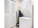 Stackable washer and dryer in laundry closet at 2705 Bushman Dr, Kissimmee, FL 34746
