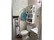 Small bathroom with toilet and small vanity at 136 Madera Dr, Winter Haven, FL 33880