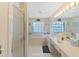 Bathroom with double sinks, soaking tub and shower at 2163 Rainbower Ct, Lakeland, FL 33810