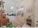 Inviting entryway with views into the living room and kitchen at 2163 Rainbower Ct, Lakeland, FL 33810