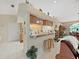 Kitchen breakfast bar with two stools at 2163 Rainbower Ct, Lakeland, FL 33810