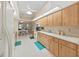 Bright kitchen with ample cabinetry and white appliances at 2163 Rainbower Ct, Lakeland, FL 33810