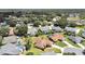 Aerial view of a residential area featuring a single-Gathering home with a pool at 2163 Rainbower Ct, Lakeland, FL 33810