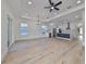 Spacious living area with hardwood floors and an open floor plan at 485 Adams View Ln, Auburndale, FL 33823