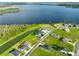Aerial view of a luxury home and waterfront community at 485 Adams View Ln, Auburndale, FL 33823