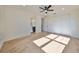 Spacious bedroom with hardwood floors, large closet and ensuite bathroom at 485 Adams View Ln, Auburndale, FL 33823
