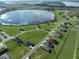 Aerial view highlighting home location in a peaceful lakefront community at 485 Adams View Ln, Auburndale, FL 33823