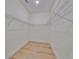 Large walk-in closet with wire shelving providing ample storage space at 485 Adams View Ln, Auburndale, FL 33823